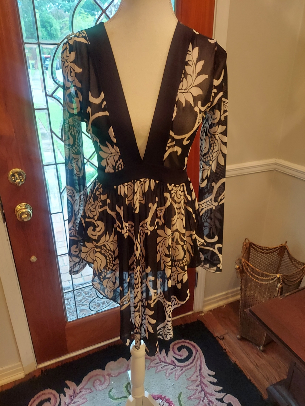 Long-Sleeve Black and Cream Floral V-Neck Peplum Tunic